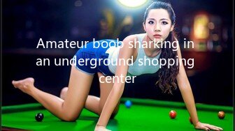 Amateur boob sharking in an underground shopping center